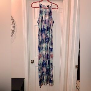 Woman’s sleeveless summer pleated dress